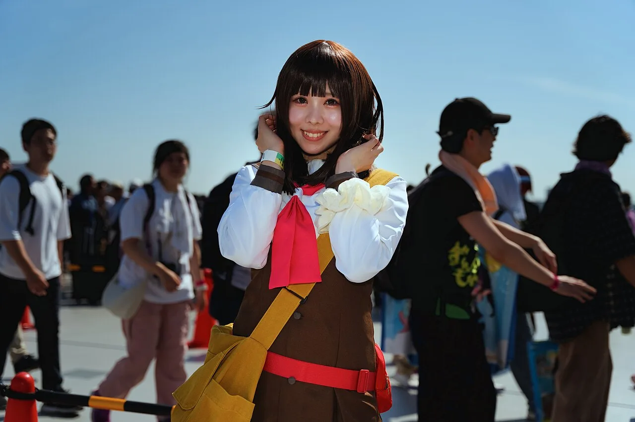 fan e cosplayer a una convention di anime e manga